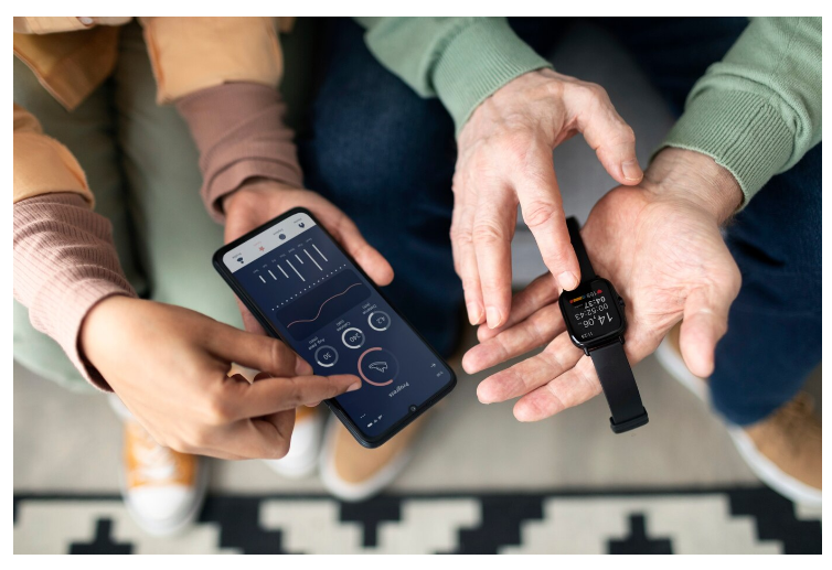 parents connectent leur téléphone à la montre connectée